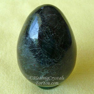 black gemstone with gold flecks