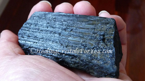 Holding Black Tourmaline Holding Black Tourmaline