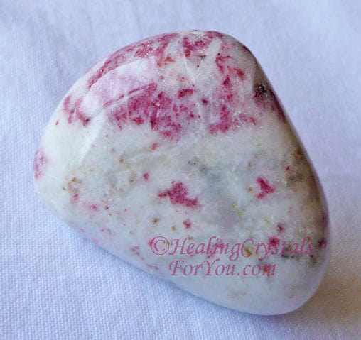 Cinnabarite is White Scapolite with Cinnabar inclusions Cinnabarite is White Scapolite with Cinnabar inclusions